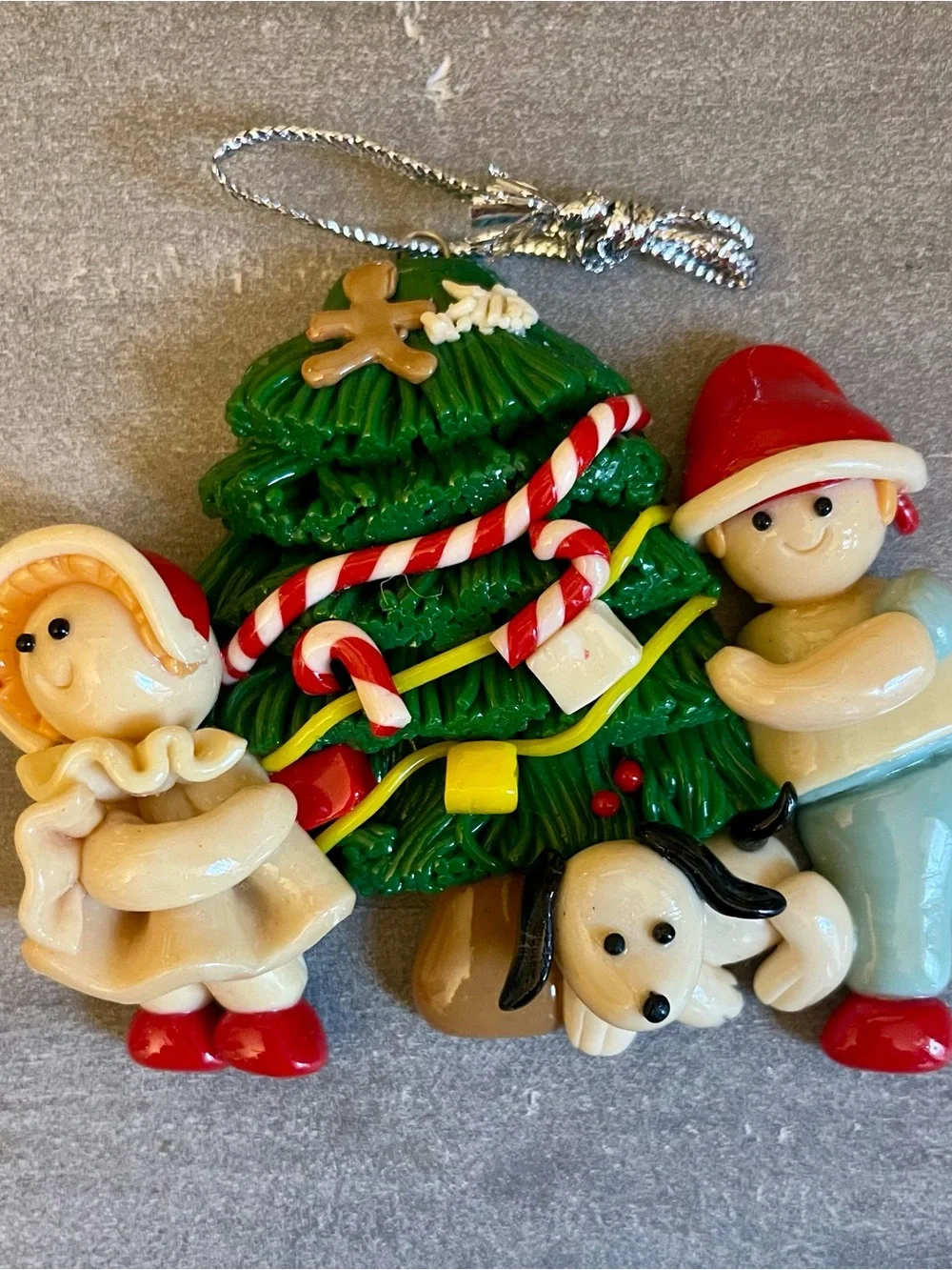 1990s - Christmas Tree Ornament with man, woman and Dog - Green, Red, Cream